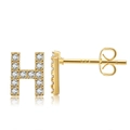 Macro shot of gold zircon HI letter studs showing the S925 sterling silver post details - Style H