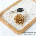 Decorative gold pine cone ornament for Christmas DIY crafts, 4-5cm size in winter snow scene - 4-5cm Golden Pine Cones