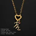 Elegant stainless steel heart clasp necklace with letter M pendant in 14K gold finish - M