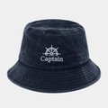 Close-up of white Captain embroidery and ship wheel logo on navy blue washed bucket hat - Navy Blue