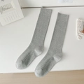 Women's grey ribbed knit knee-high socks featuring stylish vertical stripe texture - One Size / Light Gray