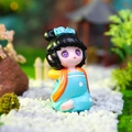 Ancient style chibi figurine in blue and orange robes standing on mossy stones - Style 20C Stretching Leg