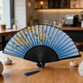 Traditional Chinese folding fan in blue with floral butterfly patterns and blue tassel - Blue Flowers Butterfly Black