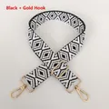 Close-up of black and white geometric diamond strap with golden metal swivel hooks - Black + Gold Hook