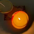Off-white clam shell shaped scented candle in lit and unlit Mediterranean style - Waffle Clam Candle [Approx. 5-8cm] / Freesia [Bagged]