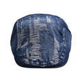 Detail of distressed denim newsboy hat showing frayed edges and vintage ripped texture - Dark Blue