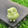 3.5cm hand-carved natural yellow-green jade owl statue on a dark wooden base - Xiu Jade