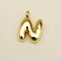 Minimalist golden letter N pendant with a polished liquid metal finish for necklaces - Letter N