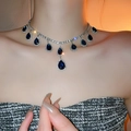 Detail of silver choker necklace featuring deep blue teardrop gems and crystal pavé accents - 47# Necklace - Silver - Blue