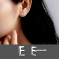 Minimalist S999 sterling silver stud earring featuring letter E design in silver finish - Letter E/Pair