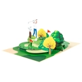 3D pop-up greeting card featuring a detailed golf course scene with golfer and trees - Golf