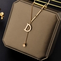 18K gold-plated stainless steel necklace with D-letter pendant and cube charm on box - Rose Gold (8817-Rose Gold)