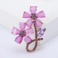 Spilla floreale elegante con petali di cristallo rosa e strass viola su metallo dorato - Viola