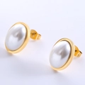 Macro view of gold stud earrings featuring oval faux pearl and polished metal edge - Gold Oval Artificial Pearl Style (Style 14)