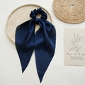 Navy blue satin hair scrunchie with long ribbon streamers on a minimalist tray - Navy Blue