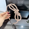 Rose gold metal headband featuring a large bow and sparkling champagne rhinestones - Champagne Rhinestone Bow Headband