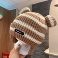 Detailed view of striped knit baby hat featuring ear flaps and cute pom-pom ears - 45-49cm (8 Months-3 Years) / Coffee Striped