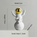 Sitting astronaut figurine in white and gold with peace sign gesture, 7.9cm height - Small Plated Gold Model C