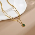 Dubbellaagse 18K vergulde ketting met slangenketting en groene edelsteen hanger - Dubbellaagse Slangenbot Groene Zirconia / Goud met groene steen