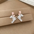 Macro shot of pink rose flower earrings with C-shaped diamond base in silver finish - Pink Rose C-Shape Style / Pink/Silver