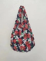 Macro detail of navy blue bubble textured tote bag with vibrant red floral pattern - Floral 12
