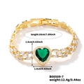 Detail shot of golden bracelet with a green heart stone and white zircon pave setting - Green Heart (B00509-7)