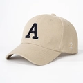 Detailed view of beige cotton baseball cap with black embroidered A and side cross logo - Khaki