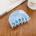 Light blue acetate hair claw clip with marble texture on vintage wooden table - 6.8cm / Sky Blue