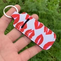 Lipstick holder keychain with red lip print on white fabric with silver metal ring - Red Lips