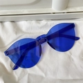 Frameless blue cat eye sunglasses with polygonal design and vibrant dopamine style - One-piece Oval Dark Blue