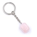 Pink polished natural agate stone keychain with silver ring and chain on white backdrop - Rose Quartz