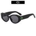 Gafas de sol ovaladas negras retro con detalle de piedra verde y cristales grises - C1-Montura Completamente Negra Lente Gris