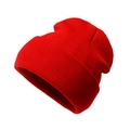 Detail view of red knitted beanie featuring premium ribbed texture and folded cuff design - Red