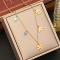 Gouden roestvrijstalen ketting met klaver, blauw hart, boze oog en vogelhangers - Klaver met Hart en Vogel Stijl (1#)