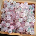 Macro shot of pink and purple crackle-textured glass beads in a wooden storage box - M54# Pink Dai [10MM Water Dyed]