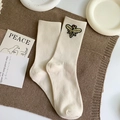 Creamy white ribbed cotton mid-tube socks with elegant 3D bee embroidery detail - One Size / Beige