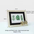 Golden ginkgo leaf photo frame with black horizontal metal stand and 7 inch glass - Ginkgo Leaf Frame-Black Horizontal 7-inch
