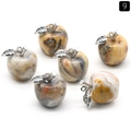 Handcrafted apple-shaped natural stone pendants with silver leaf metal accents - Crazy Agate