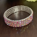 Sparkling four-row AB color rhinestone elastic bridal bracelet with a glossy finish - 4 Row Silver AB Pink Rhinestone Bracelet