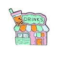 Cartoon enamel pin featuring a pink and green boba tea drink shop house design - Drink Shop