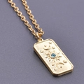 Pendente rettangolare dorato con sole, luna, stelle e intarsio di cristallo blu - Collana / Oro