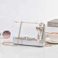 White woven crossbody bag for women with golden chain strap and pearl bow charm detail - With Pendant / Small / White