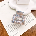 Rectangle acetate hair claw clip with blue and orange marble pattern finish - Blue Gold