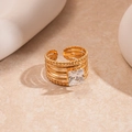 Close-up of golden multi-layer open ring with square zircon and beaded texture detail - Gold Square Multi Layer