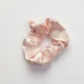 Elegant pink satin scrunchie with silky smooth texture for stylish hair styling - Scrunchie_Flesh Pink