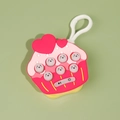 Cupcake-shaped pop puzzle game toy in pink and red with white clip and animal buttons - Cake