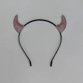 Macro detail of pink glitter devil horns on a black festive headband for parties - Pink Glitter Small Horn