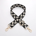 Detail of adjustable black and white houndstooth canvas bag strap with gold metal buckles - J44-A2-Black White Houndstooth / Light gold