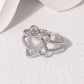 Anello a stella argento minimalista con finitura martellata e fascia aperta regolabile - Color Acciaio