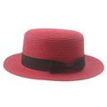 Détail d'un chapeau canotier rouge avec ruban en gros-grain noir et un noeud - Bordeaux